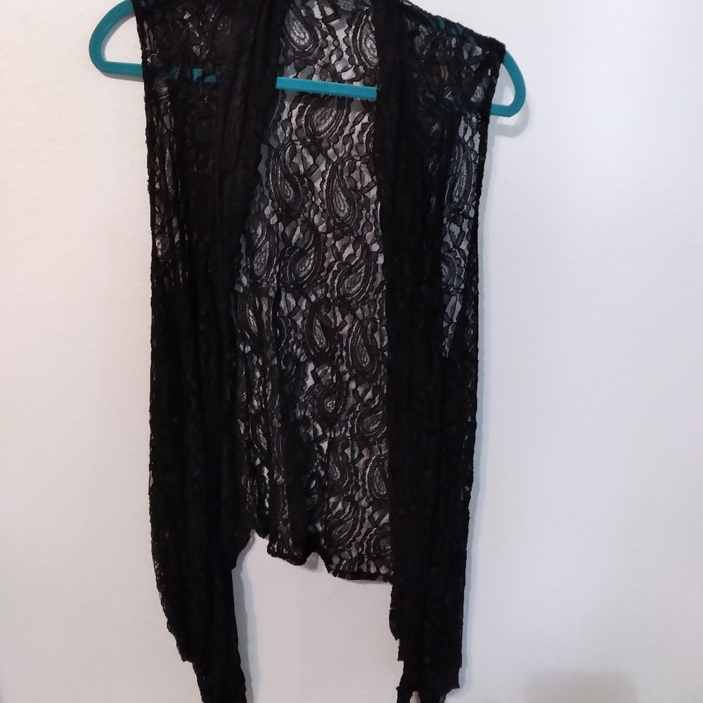 Black lace vest.